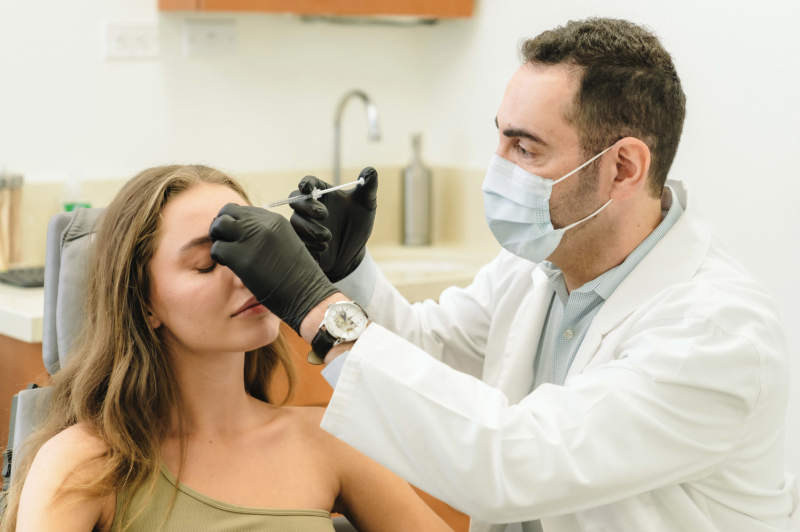 Dr. Zeidan with a female patient